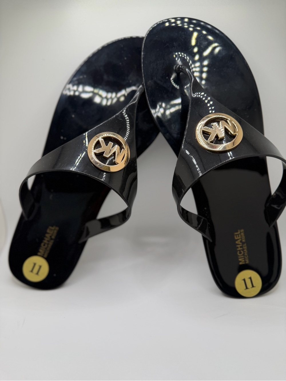 Michael Kors Black Patent Logo Jelly Thong Sandals with Gold Emblem